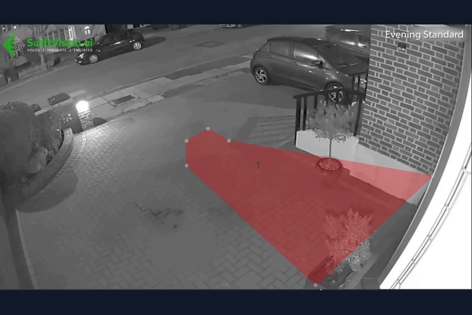 Restricted zone being drawn in red on a CCTV view of a driveway